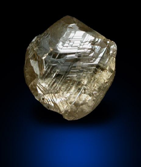 Diamond (1.96 carat gray-brown elongated crystal) from Diavik Mine, East Island, Lac de Gras, Northwest Territories, Canada