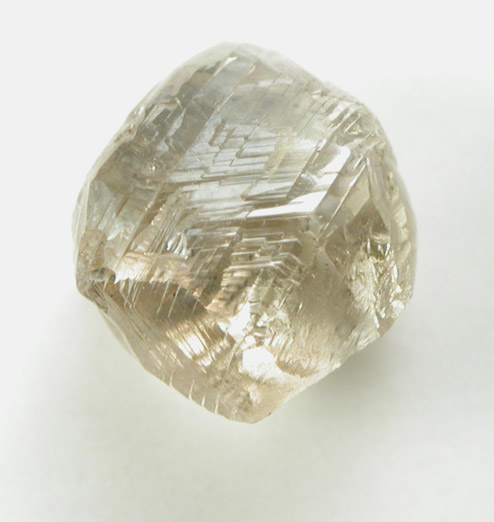 Diamond (1.96 carat gray-brown elongated crystal) from Diavik Mine, East Island, Lac de Gras, Northwest Territories, Canada