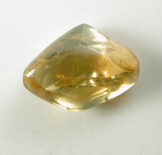 Diamond (0.88 carat orange elongated dodecahedral crystal) from Letlhakane Mine, south of the Makgadikgadi Pans, Botswana