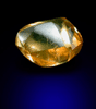 Diamond (0.94 carat orange elongated dodecahedral crystal) from Letlhakane Mine, south of the Makgadikgadi Pans, Botswana