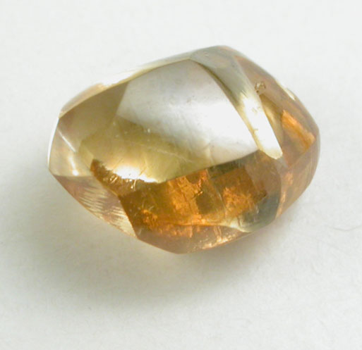 Diamond (0.94 carat orange elongated dodecahedral crystal) from Letlhakane Mine, south of the Makgadikgadi Pans, Botswana