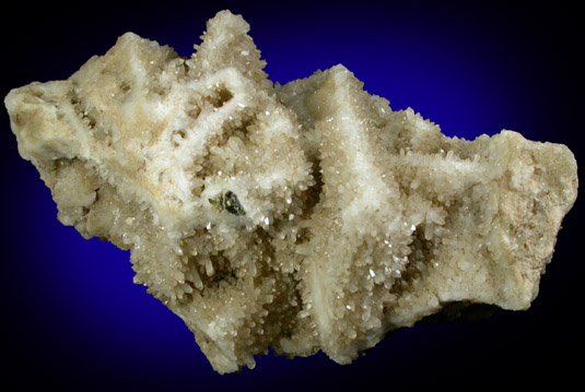 Quartz pseudomorphs after unknown from Old Mine Pit, Harvard Quarry, Greenwood, Oxford County, Maine