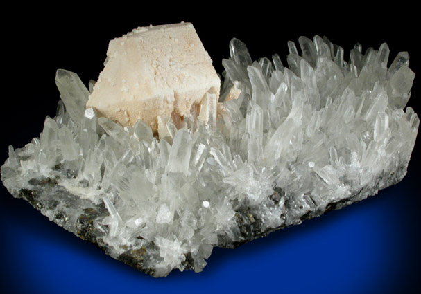 Dolomite over twinned Calcite crystals on Quartz from Raura District, Cajatambo Province, Peru