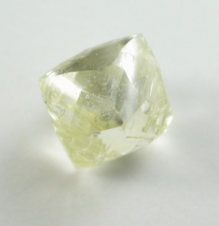 Diamond (0.58 carat pale-yellow octahedral crystal) from Letlhakane Mine, south of the Makgadikgadi Pans, Botswana