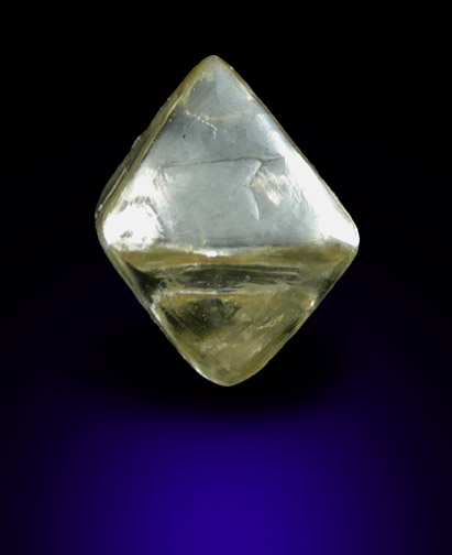 Diamond (0.77 carat yellow-gray octahedral crystal) from Oranjemund District, southern coastal Namib Desert, Namibia