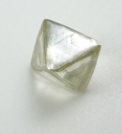Diamond (0.77 carat yellow-gray octahedral crystal) from Oranjemund District, southern coastal Namib Desert, Namibia