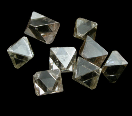 Diamond (8 octahedral crystals totaling 0.76 carats) from Mirny, Republic of Sakha, Siberia, Russia