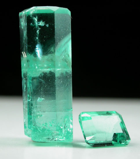 Beryl var. Emerald (crystal and faceted gemstone) from Muzo Mine, Vasquez-Yacop District, Boyac Department, Colombia