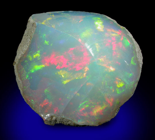 Opal var. Crystal Fire Opal from 570 km north of Addis Ababa, Wello (Wollo), Delanta Plateau, Tigray, Ethiopia