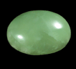 Prehnite (polished oval cabochon) from Prospect Park Quarry, Prospect Park, Passaic County, New Jersey