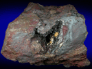 Millerite on Hematite with Dolomite from Sterling Mine, Antwerp, Jefferson County, New York