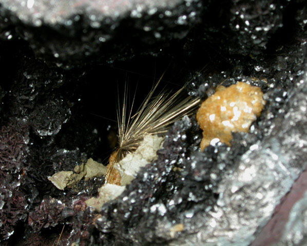 Millerite on Hematite with Dolomite from Sterling Mine, Antwerp, Jefferson County, New York