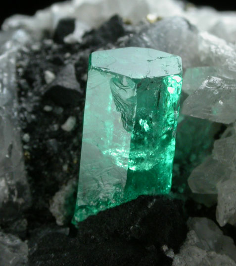 Beryl var. Emerald in Calcite with Pyrite from Muzo Mine, Vasquez-Yacop District, Boyac Department, Colombia