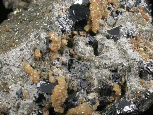 Pyrite pseudomorphs after Pyrrhotite on Sphalerite with Siderite from Herja Mine (Kisbanya), Baia Mare, Maramures, Romania