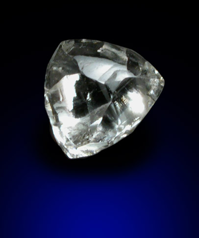 Diamond (0.44 carat colorless triangular crystal) from Oranjemund District, southern coastal Namib Desert, Namibia