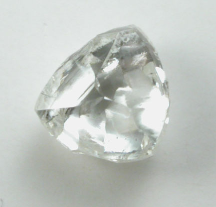 Diamond (0.44 carat colorless triangular crystal) from Oranjemund District, southern coastal Namib Desert, Namibia