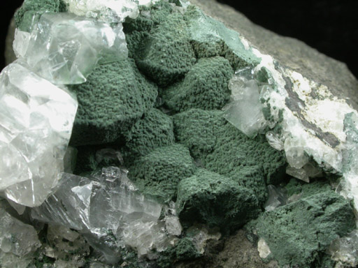 Pumpellyite pseudomorphs after Analcime with Calcite from O and G Industries Southbury Quarry, Southbury, New Haven County, Connecticut