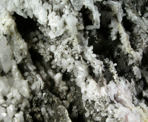 Quartz in etched Spodumene from Tamminen Quarry, Greenwood, Oxford County, Maine