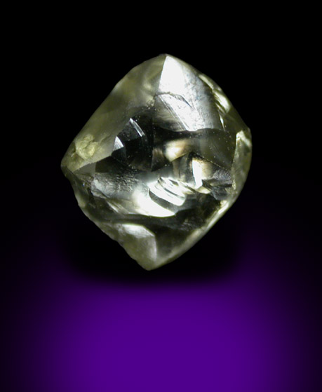 Diamond (0.97 carat green-gray flattened crystal) from Oranjemund District, southern coastal Namib Desert, Namibia