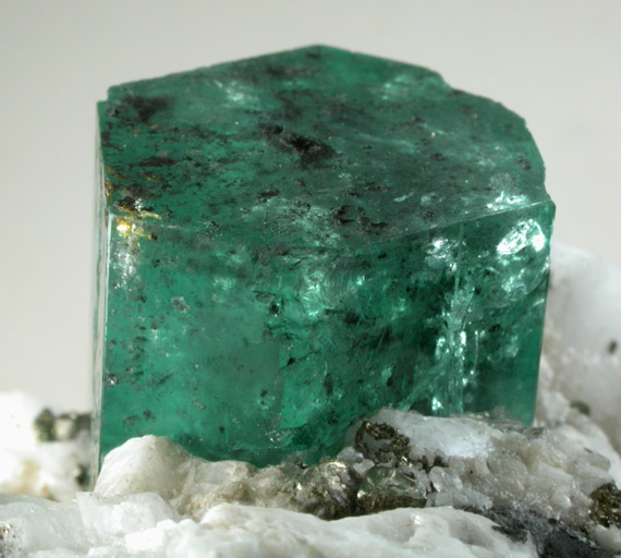 Beryl var. Emerald on Calcite with Pyrite from Muzo Mine, Vasquez-Yacop District, Boyac Department, Colombia