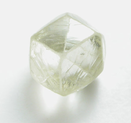 Diamond (0.89 carat yellow-gray dodecahedral crystal) from Oranjemund District, southern coastal Namib Desert, Namibia