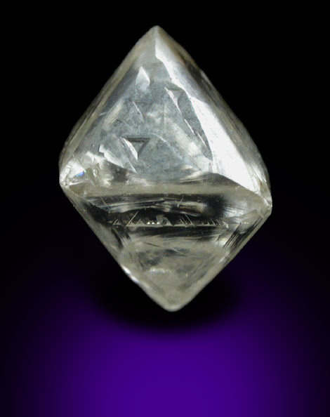 Diamond (1.71 carat pale-yellow octahedral crystal) from Udachnaya Mine, Republic of Sakha, Siberia, Russia