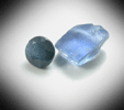 Corundum var. Sapphire (rough and 0.08 carat faceted gemstone) from Yogo Gulch Sapphire Mining District, Judith Basin County, Montana