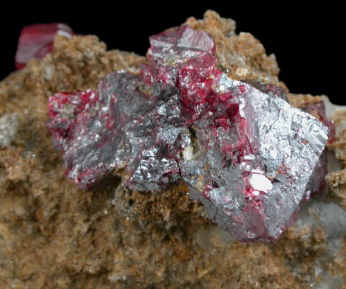 Cinnabar (penetration twin) on Quartz-rich matrix from Red Bird Mine, Antelope Springs District, 24 km east of Lovelock, Pershing County, Nevada