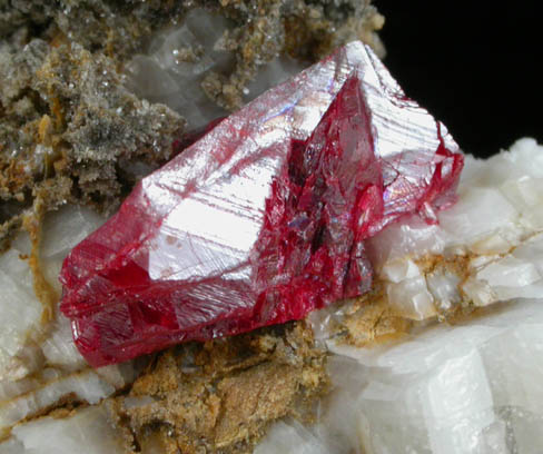 Cinnabar (penetration twin) on Calcite from Red Bird Mine, Antelope Springs District, 24 km east of Lovelock, Pershing County, Nevada