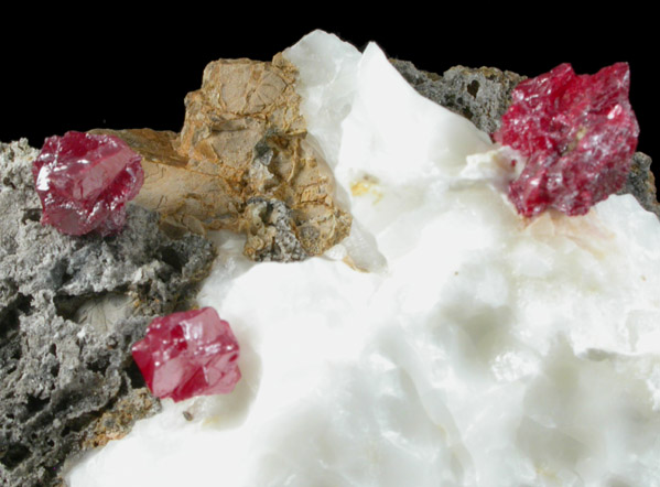 Cinnabar (penetration twins) on Calcite from Red Bird Mine, Antelope Springs District, 24 km east of Lovelock, Pershing County, Nevada