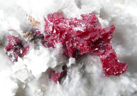 Cinnabar (penetration twins) on Calcite with Quartz from Red Bird Mine, Antelope Springs District, 24 km east of Lovelock, Pershing County, Nevada