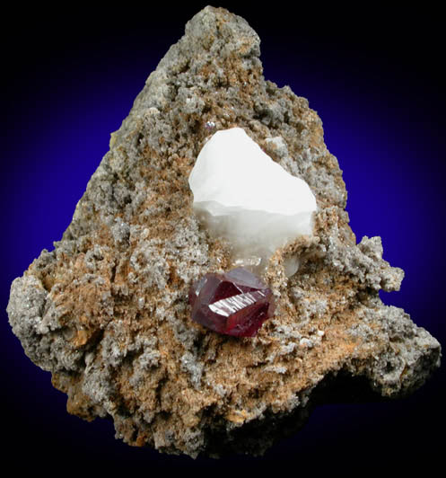 Cinnabar (penetration twin) on Quartz-rich matrix from Red Bird Mine, Antelope Springs District, 24 km east of Lovelock, Pershing County, Nevada