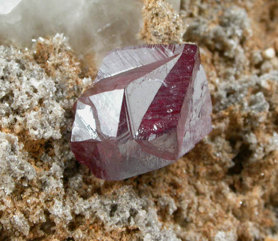 Cinnabar (penetration twin) on Quartz-rich matrix from Red Bird Mine, Antelope Springs District, 24 km east of Lovelock, Pershing County, Nevada