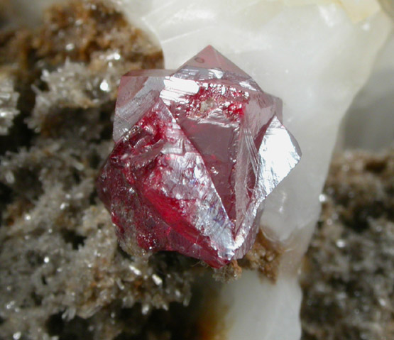 Cinnabar (penetration twins) on Calcite from Red Bird Mine, Antelope Springs District, 24 km east of Lovelock, Pershing County, Nevada