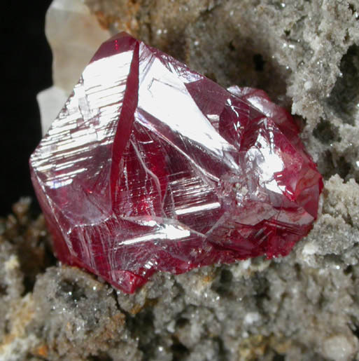 Cinnabar (penetration twins) on Calcite from Red Bird Mine, Antelope Springs District, 24 km east of Lovelock, Pershing County, Nevada