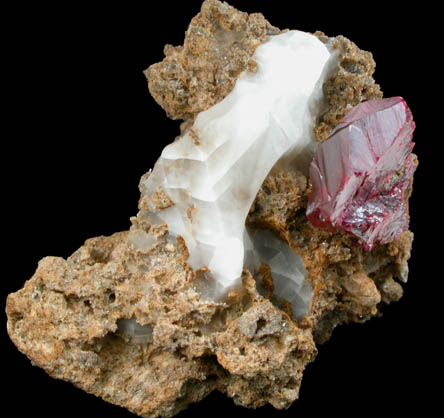 Cinnabar (penetration twin) on Quartz-rich matrix from Red Bird Mine, Antelope Springs District, 24 km east of Lovelock, Pershing County, Nevada