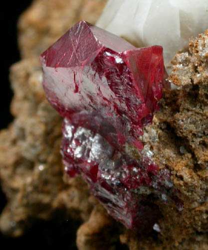 Cinnabar (penetration twin) on Quartz-rich matrix from Red Bird Mine, Antelope Springs District, 24 km east of Lovelock, Pershing County, Nevada