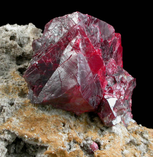 Cinnabar (penetration twin) on Quartz-rich matrix from Red Bird Mine, Antelope Springs District, 24 km east of Lovelock, Pershing County, Nevada