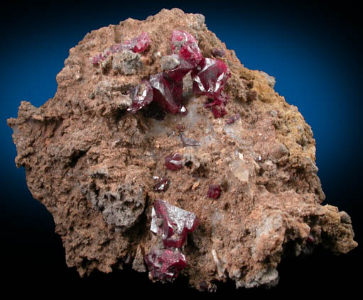 Cinnabar (penetration twins) on Quartz-rich matrix from Red Bird Mine, Antelope Springs District, 24 km east of Lovelock, Pershing County, Nevada