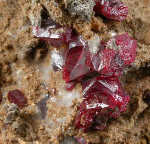 Cinnabar (penetration twins) on Quartz-rich matrix from Red Bird Mine, Antelope Springs District, 24 km east of Lovelock, Pershing County, Nevada