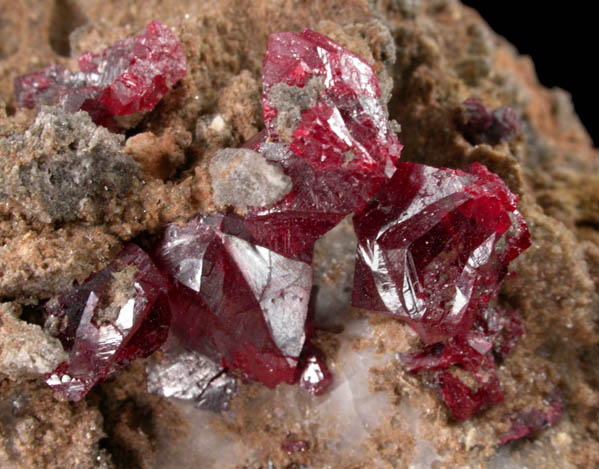 Cinnabar (penetration twins) on Quartz-rich matrix from Red Bird Mine, Antelope Springs District, 24 km east of Lovelock, Pershing County, Nevada