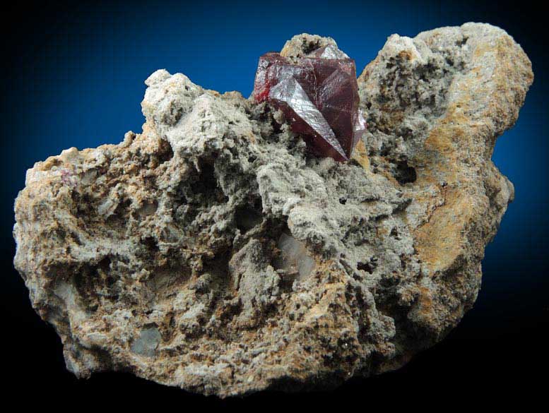 Cinnabar (penetration twin) on Quartz-rich matrix from Red Bird Mine, Antelope Springs District, 24 km east of Lovelock, Pershing County, Nevada