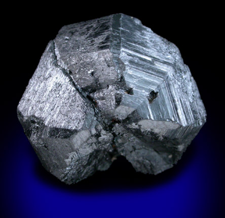 Rutile (cyclic twins) from Magnet Cove, Hot Spring County, Arkansas