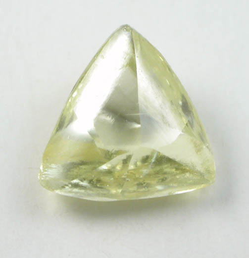 Diamond (0.83 carat fancy-yellow macle, twinned crystal) from Damtshaa Mine, near Orapa, Botswana