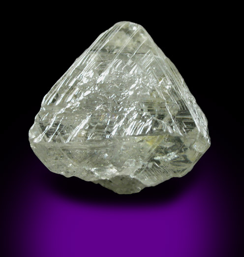 Diamond (6.85 carat asymmetric gray octahedral crystal) from Aredor Mine, 35 km east of Kerouan, Guinea