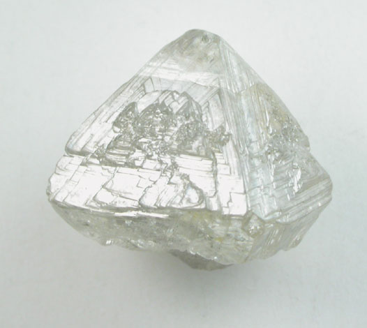 Diamond (6.85 carat asymmetric gray octahedral crystal) from Aredor Mine, 35 km east of Kerouan, Guinea