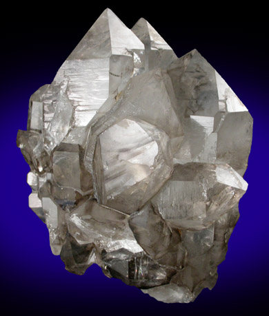 Quartz var. Smoky Quartz (parallel growth) from Mount Marie Quarry, 7.5 km southeast of Paris Hill, Oxford County, Maine