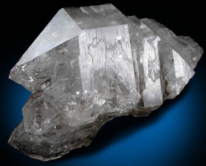 Quartz var. Smoky Quartz (parallel growth) from Mount Marie Quarry, 7.5 km southeast of Paris Hill, Oxford County, Maine