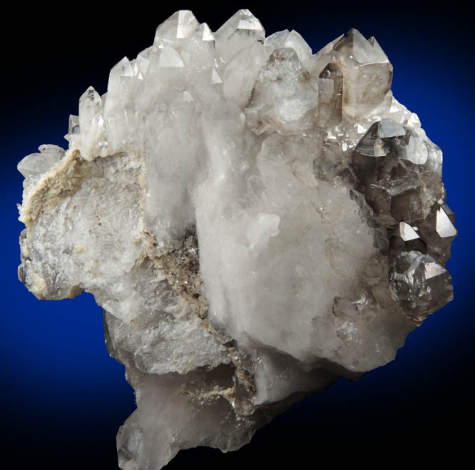 Quartz var. Smoky Quartz (parallel growth) from Mount Marie Quarry, 7.5 km southeast of Paris Hill, Oxford County, Maine