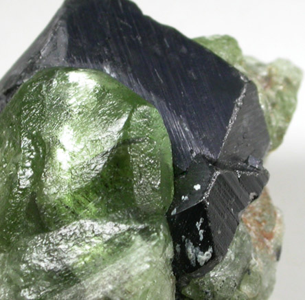 Forsterite var. Peridot with Ludwigite inclusions on Magnetite from Suppatt, Kohistan District, North-West Frontier Province, Pakistan